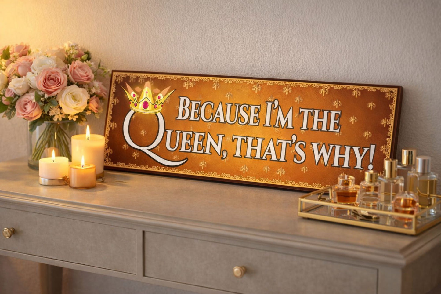 Queen humor sign displayed on dresser with candles and decor