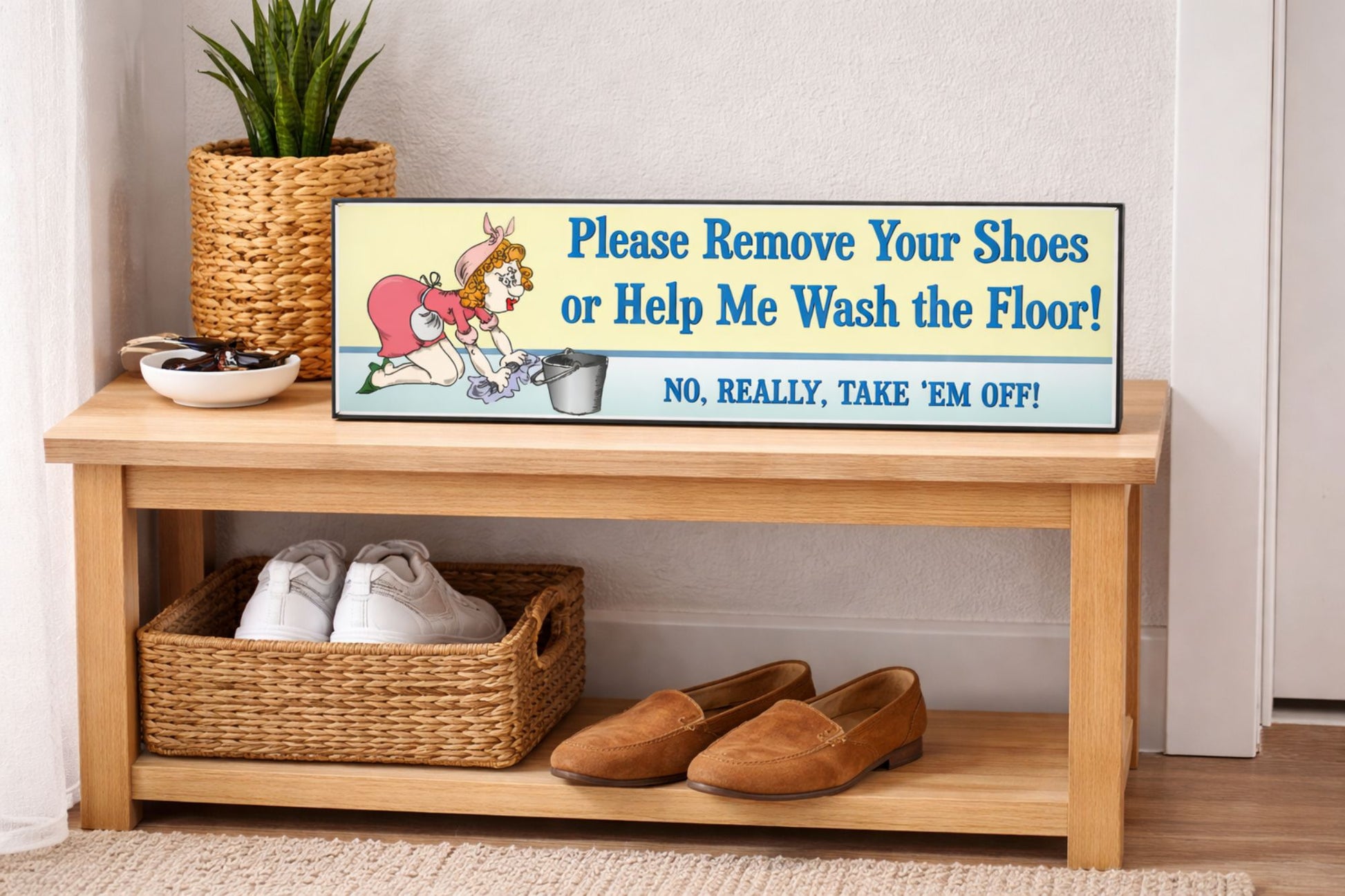 entryway bench with please remove your shoes sign and shoes stored underneath