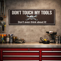 Workshop lifestyle image with humorous tool warning sign