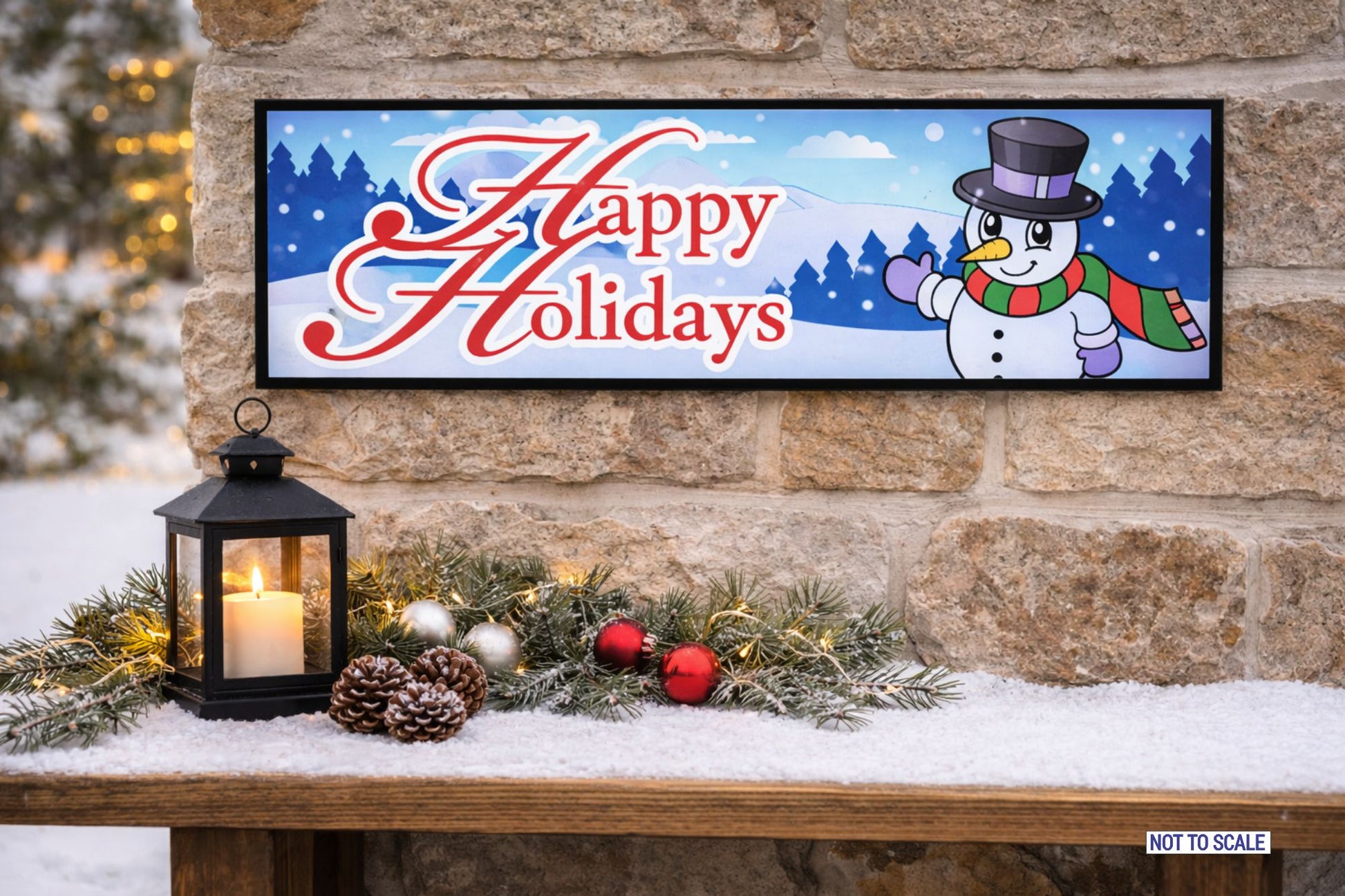 Happy Holidays snowman sign displayed on outdoor winter wall
