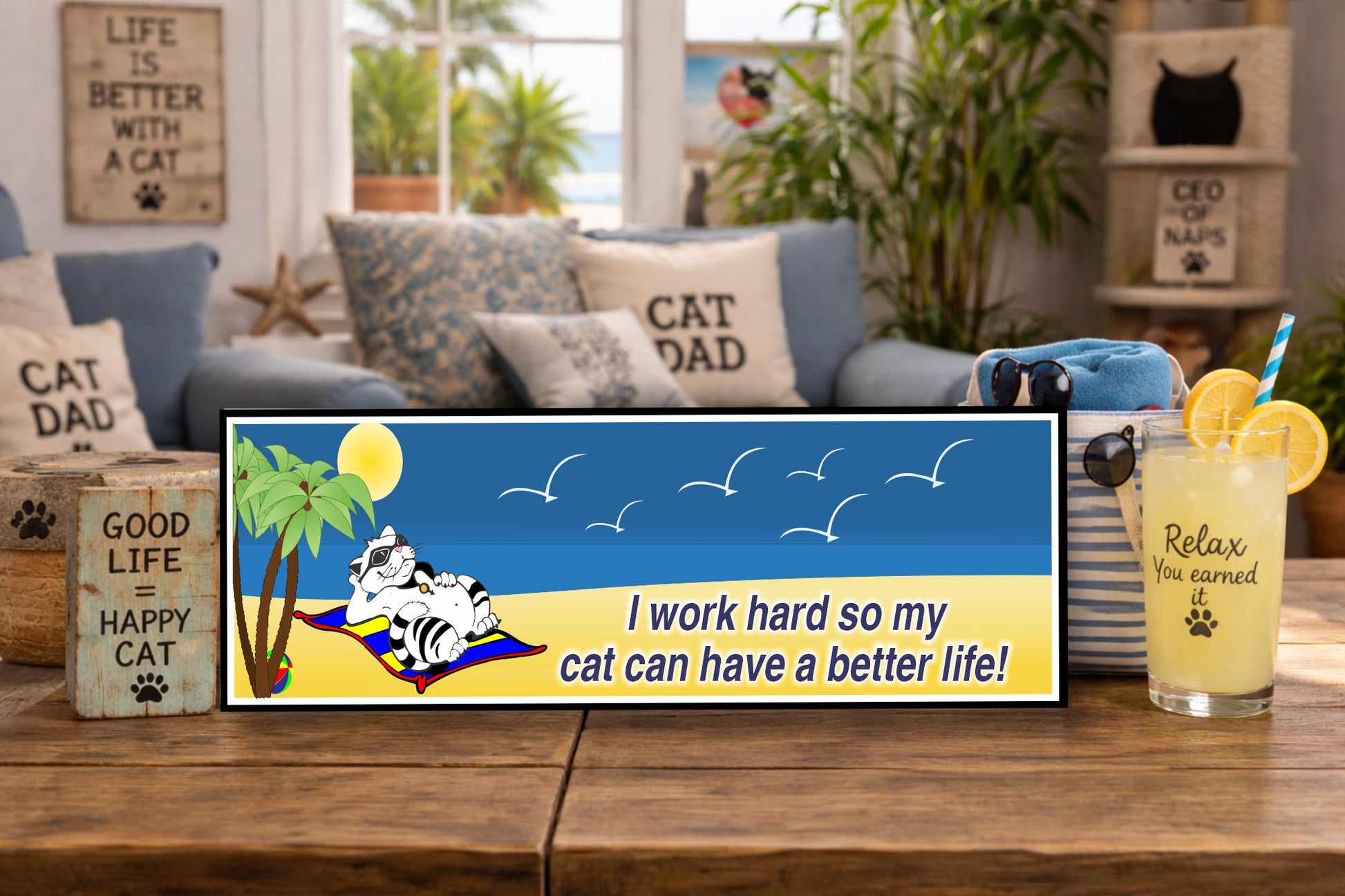 Beach-themed cat sign displayed on wooden table in bright coastal living room with tropical decor drink and cat-themed accents