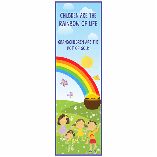 children are the rainbow of life sign with colorful rainbow sun and kids illustration displayed on tabletop