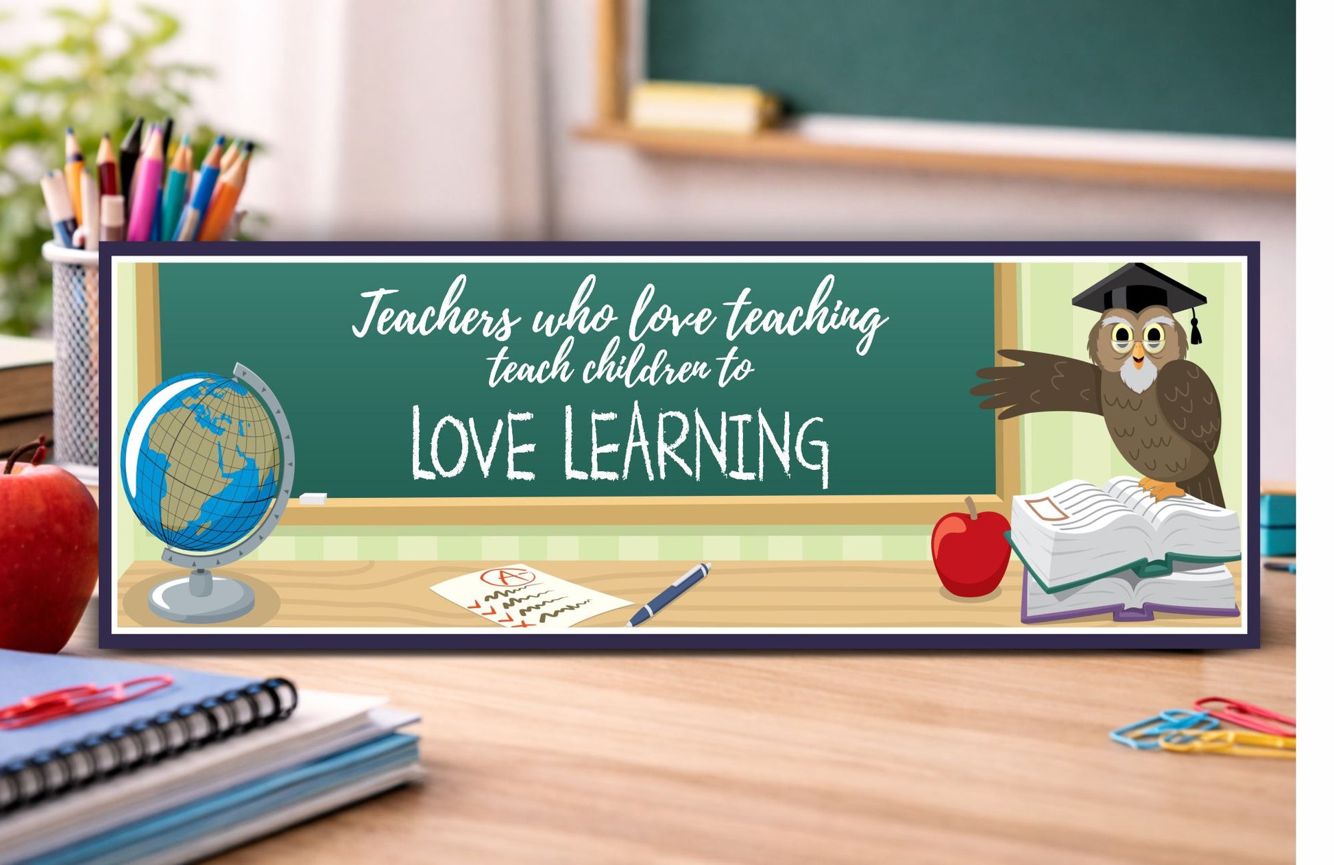 teacher classroom decor sign sitting on desk with globe books and apple