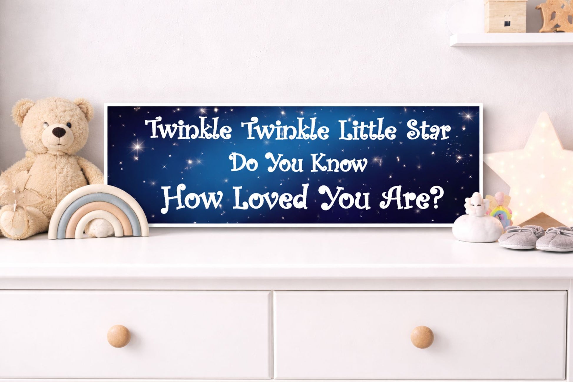 twinkle twinkle little star baby nursery sign displayed on dresser with teddy bear and star nightlight