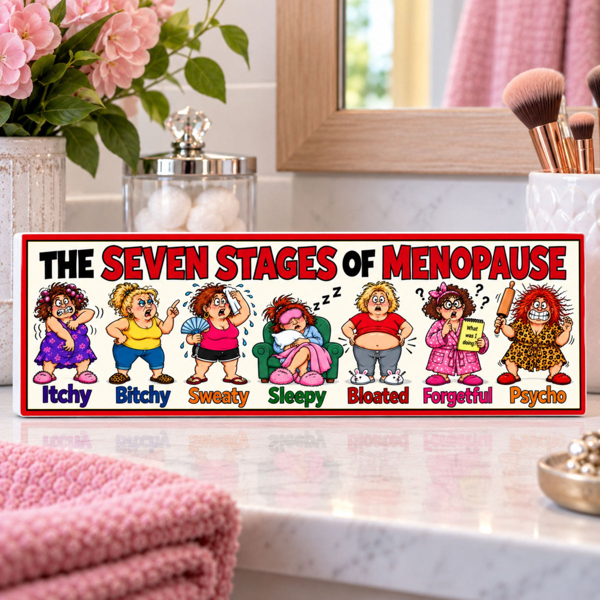 Funny Seven Stages of Menopause 16×5 sign displayed on a bright bathroom vanity with colorful cartoon artwork.