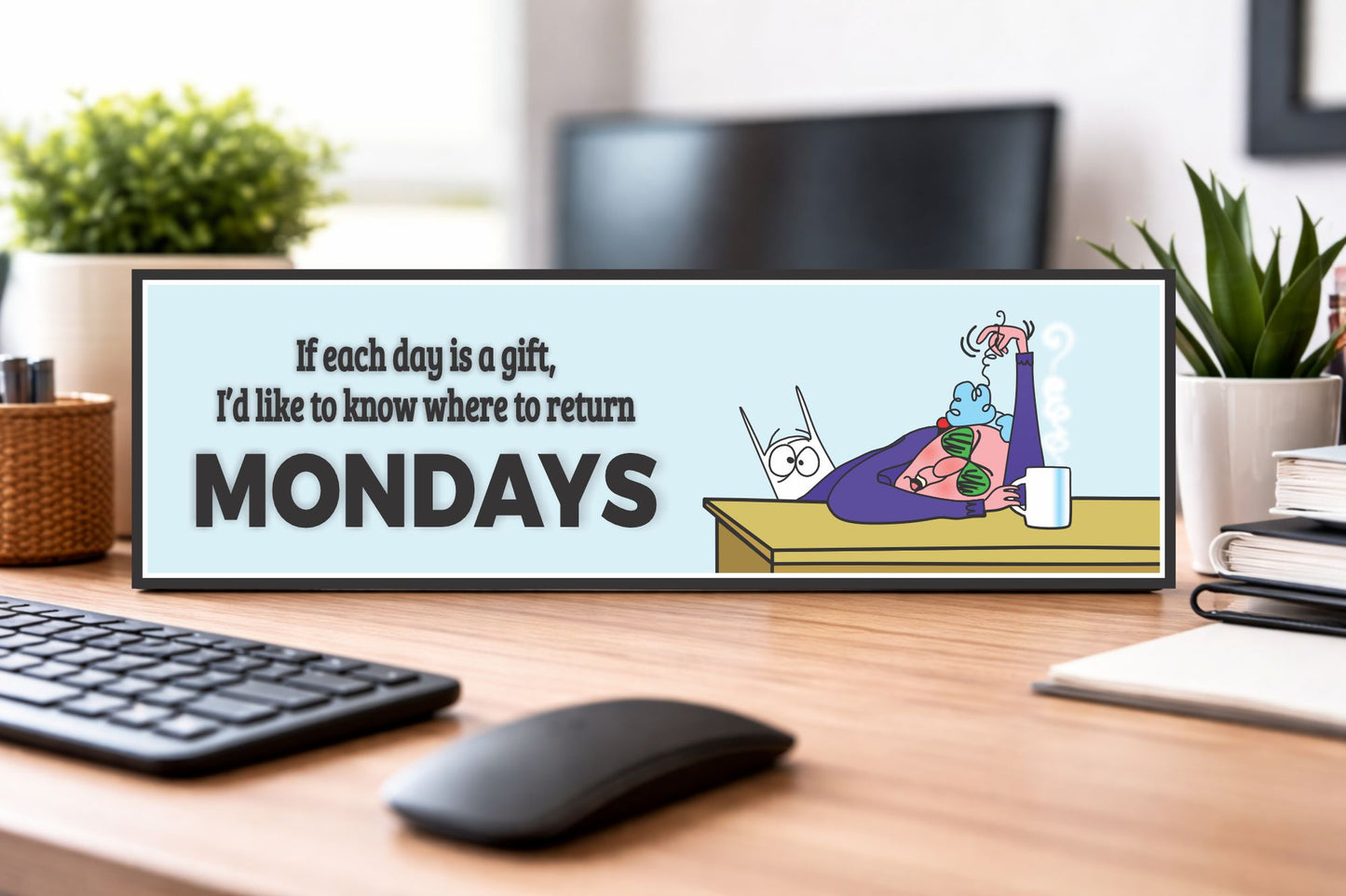 office desk lifestyle image showing small humor sign with keyboard and plants