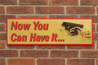 Sign with 'Now You Can Have It...' text on a brick wall background