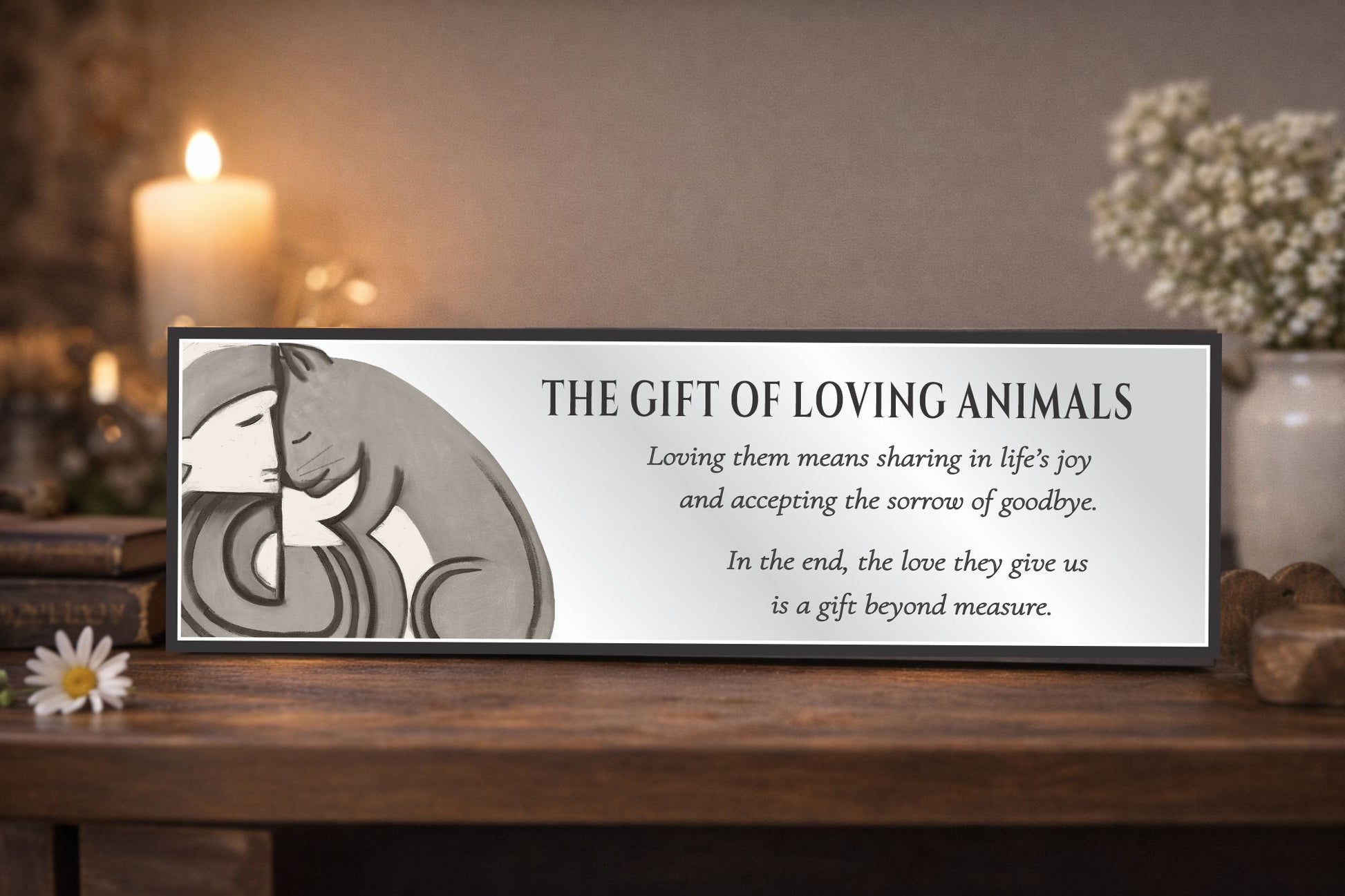 pet memorial sign displayed on wooden shelf with candle and flowers in soft lighting