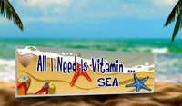 All I Need is Vitamin Sea Beach Sign with Floral Flip Flops, Seashell, Starfish and Overhead View of Surf