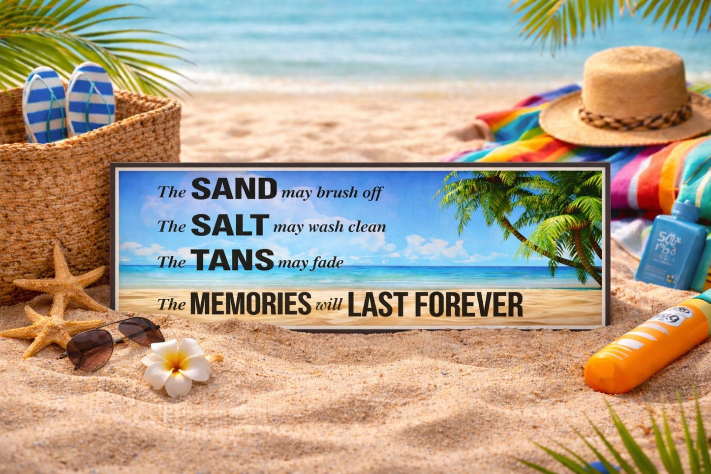 coastal beach sign displayed in sand with ocean view and summer accessories