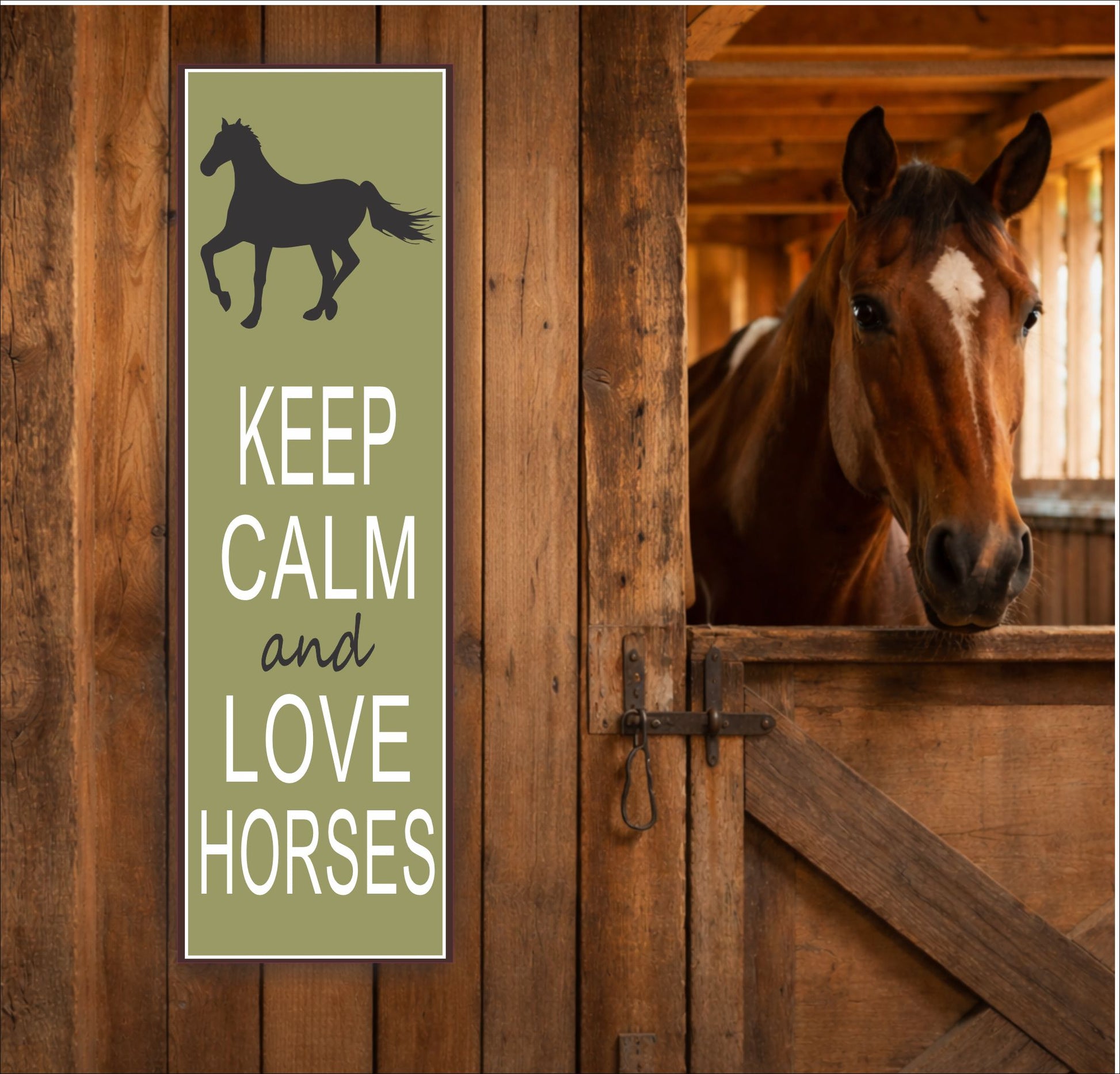 Keep Calm and Love Horses sign mounted on wooden barn door beside a horse