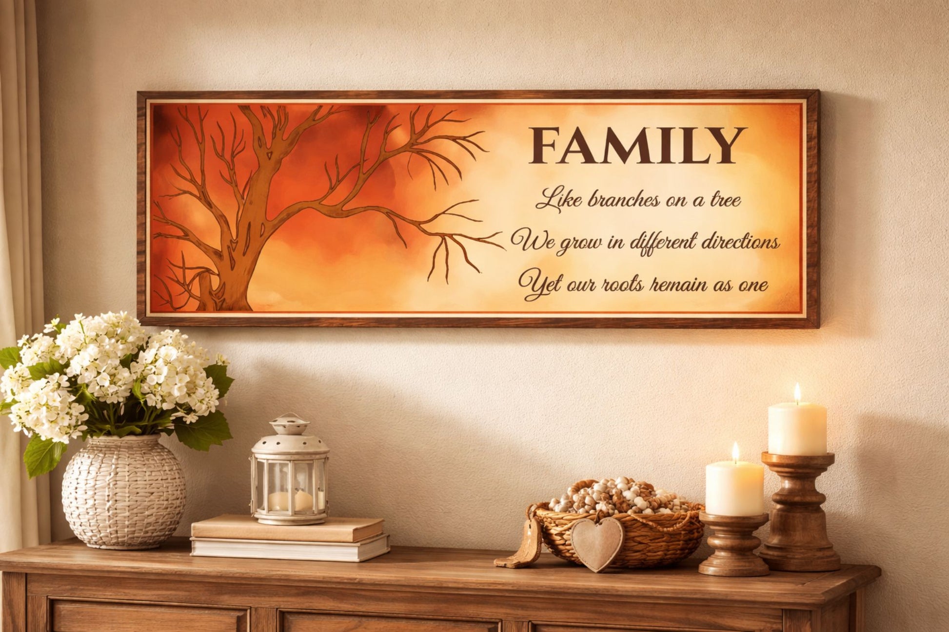 family tree inspirational quote sign displayed above a wooden console table with flowers candles and warm home decor