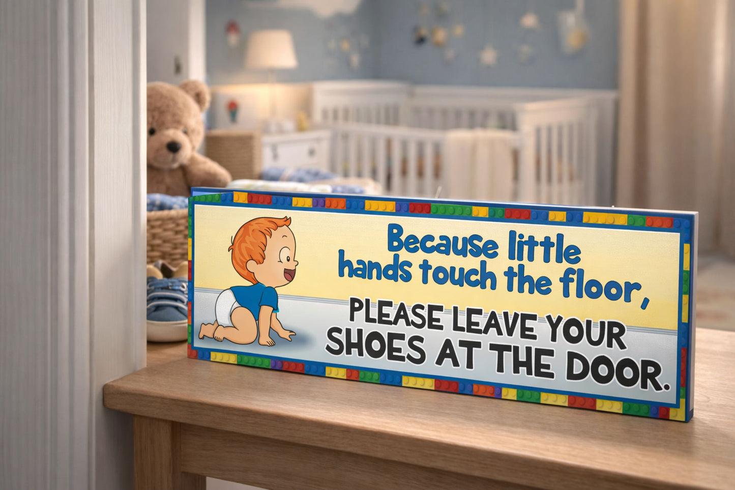 Nursery entry table with red hair baby shoes off sign near doorway