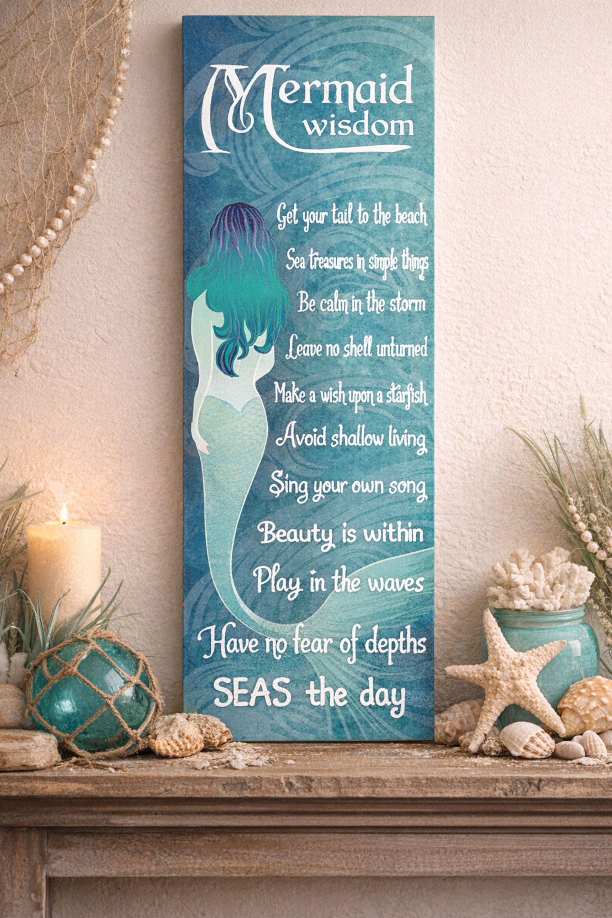 Mermaid Wisdom vertical beach wall decor displayed on coastal mantel with seashell accents