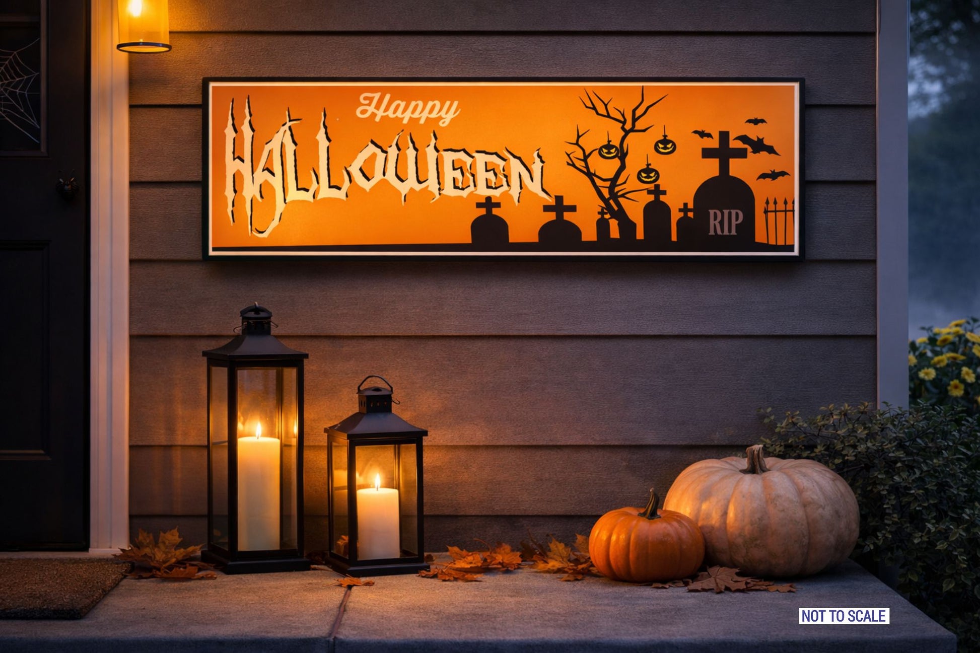 Happy Halloween graveyard wall sign displayed on porch with lanterns and pumpkins