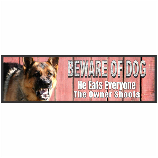 beware of dog warning sign with snarling german shepherd and humorous text he eats everyone the owner shoots on rustic red wood background