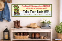 Western entryway sign displayed above bench with cowboy boots and hat