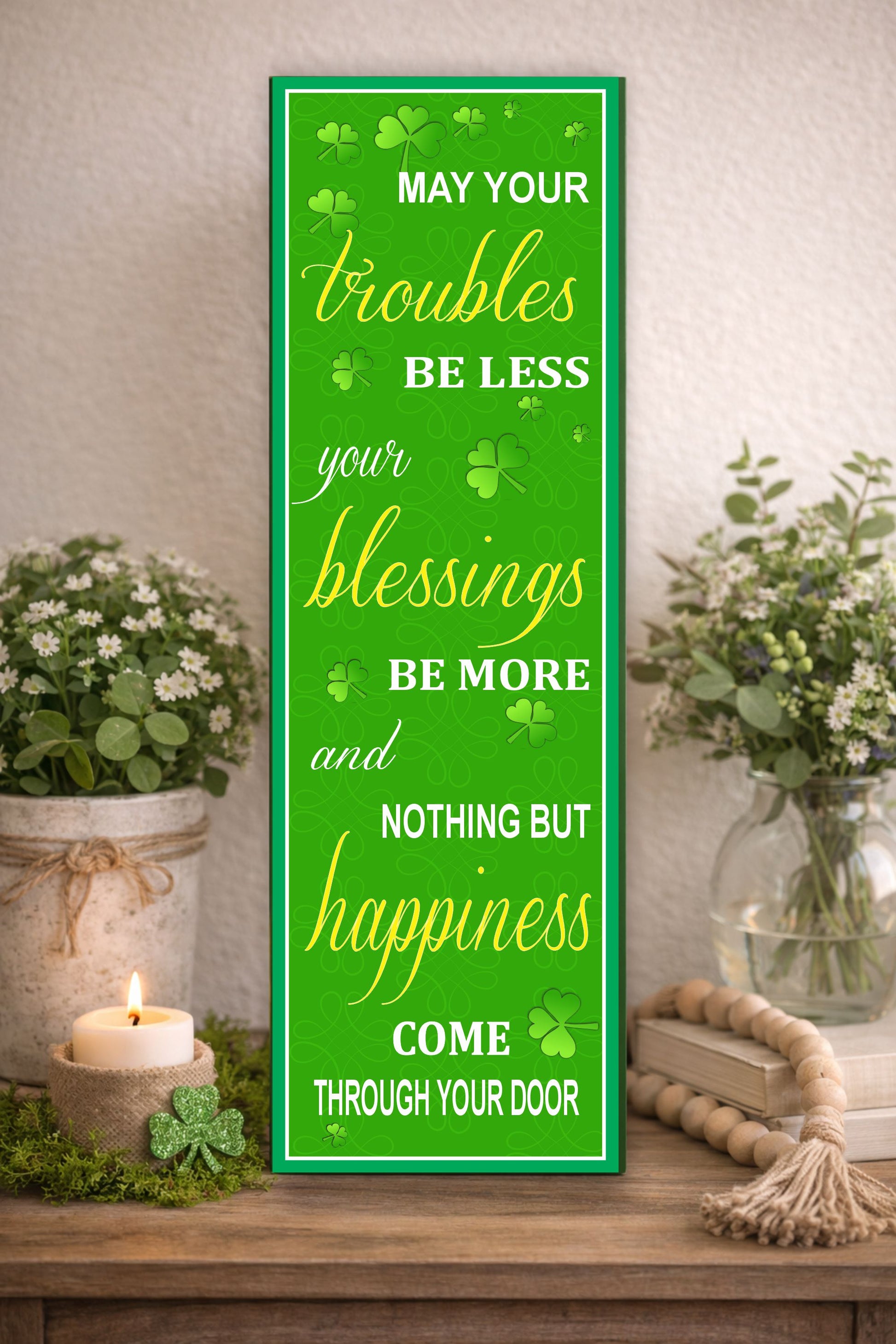 vertical st patricks day sign on tabletop with plants and candle irish blessing may your troubles be less blessings more happiness
