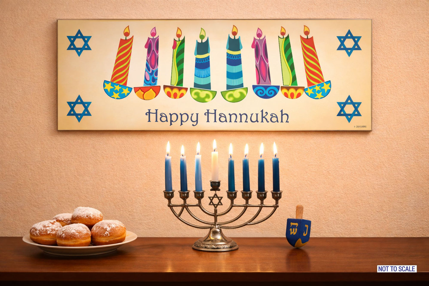 Happy Hannukah rectangular wall sign displayed above a table with menorah candles and traditional holiday décor not to scale