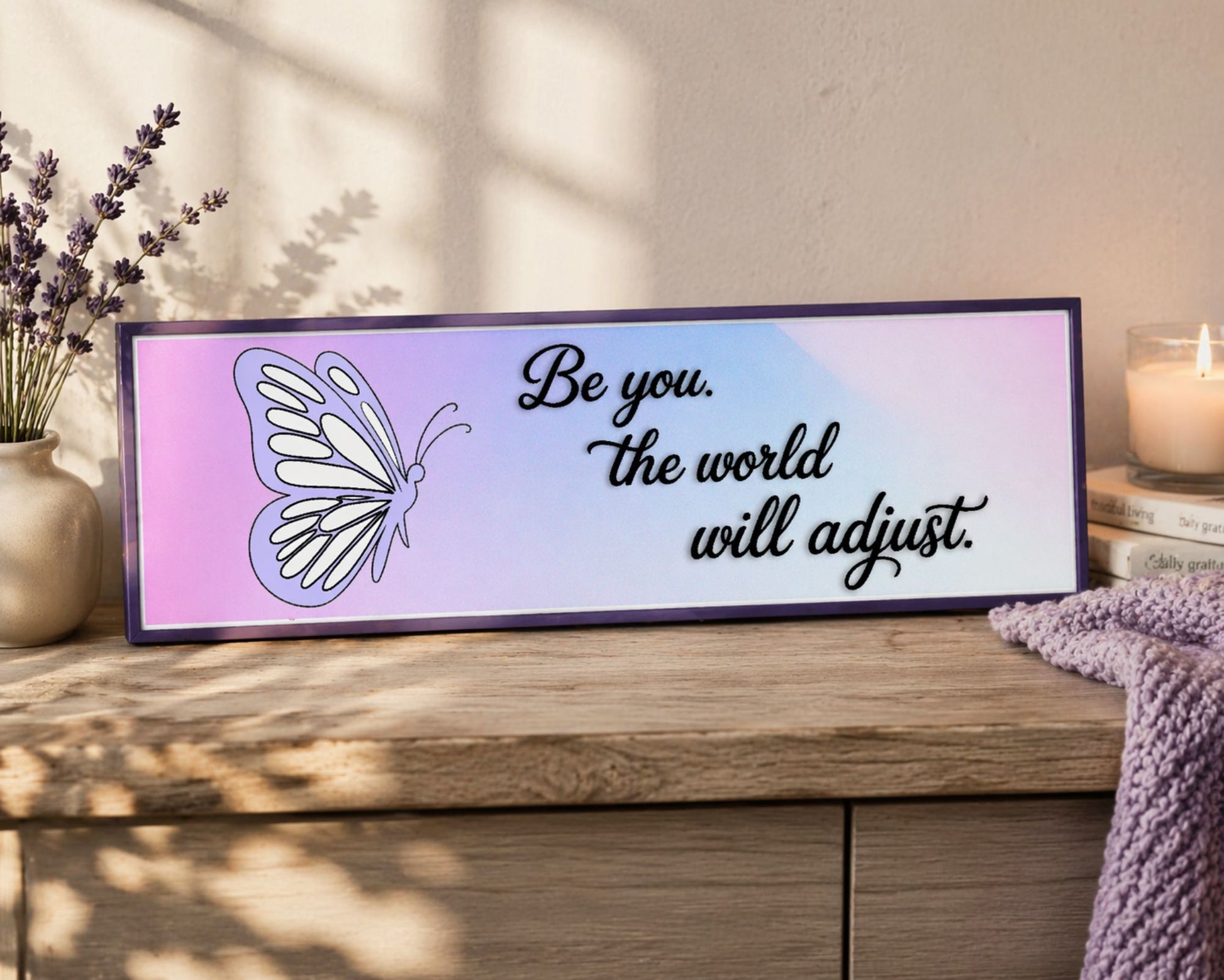 pastel butterfly quote sign on shelf with soft lighting and feminine decor