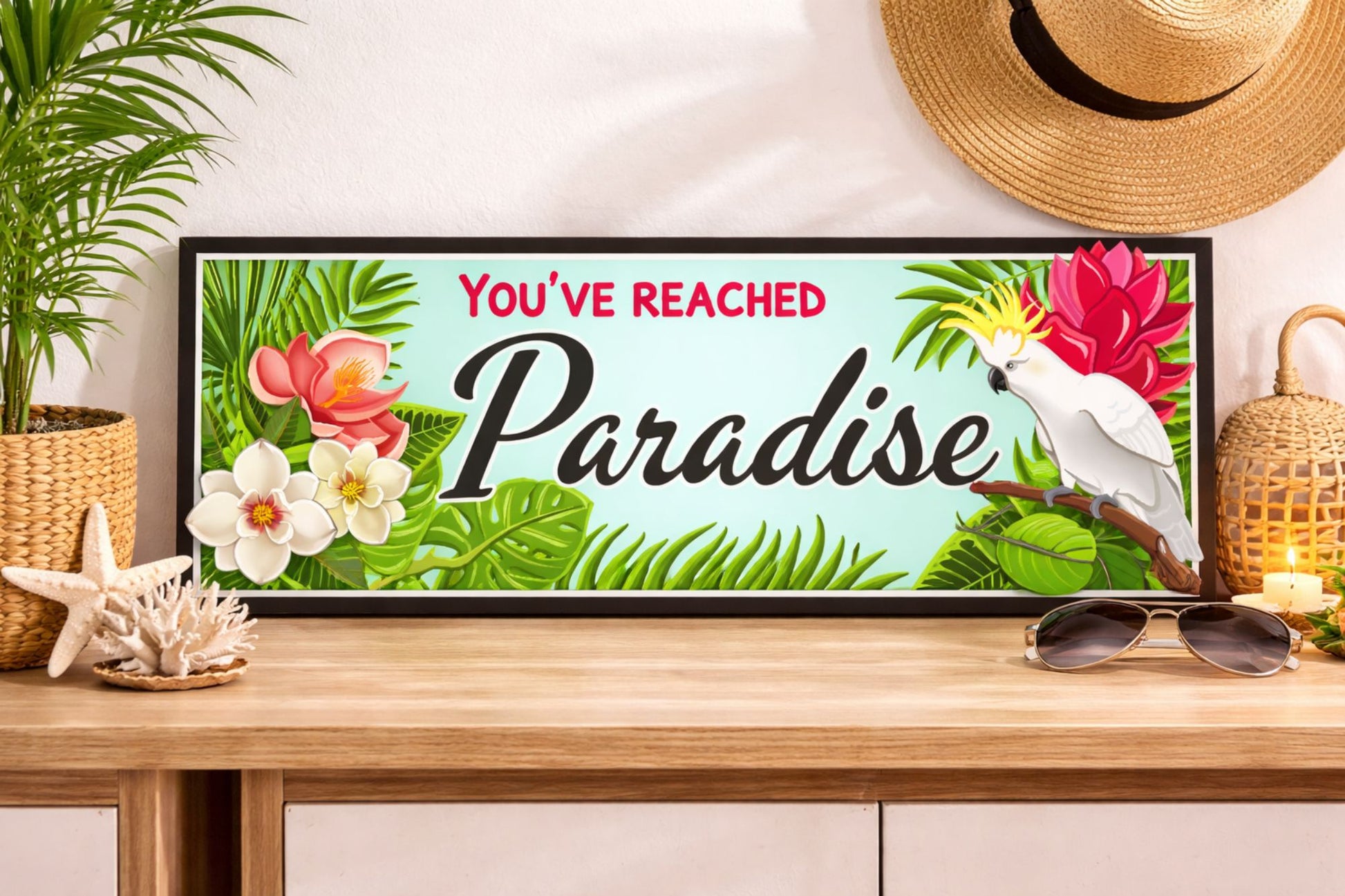 tropical paradise sign on wooden table with palm plant starfish sunglasses and beach decor