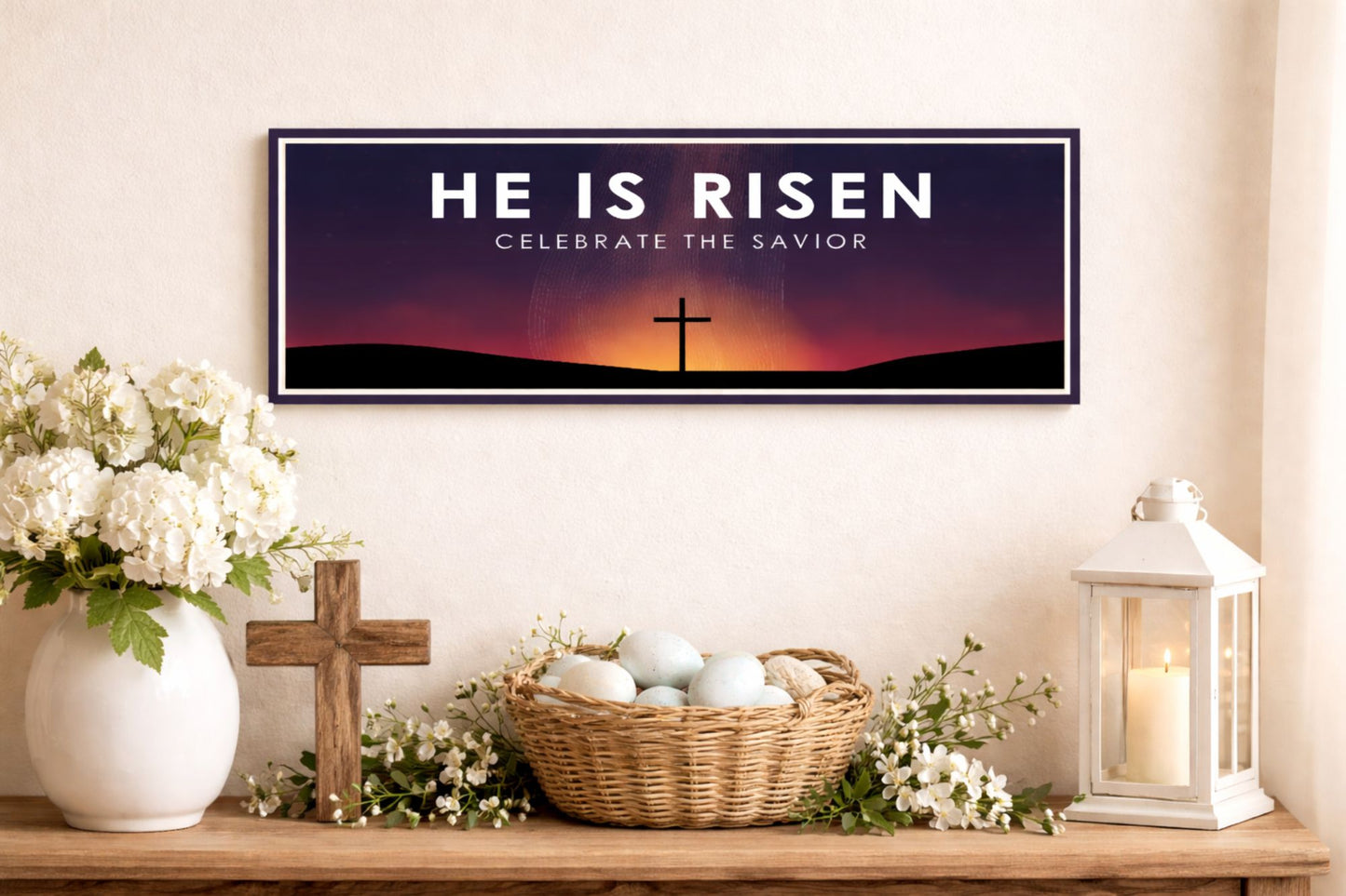 He Is Risen faith sign displayed above an Easter themed mantel with flowers, basket of eggs, and lantern decor