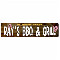 Personalized barbecue sign on rustic wood background with cute pig graphic and the phrase “The Finest Barbecue in Town.”