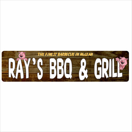 Personalized barbecue sign on rustic wood background with cute pig graphic and the phrase “The Finest Barbecue in Town.”