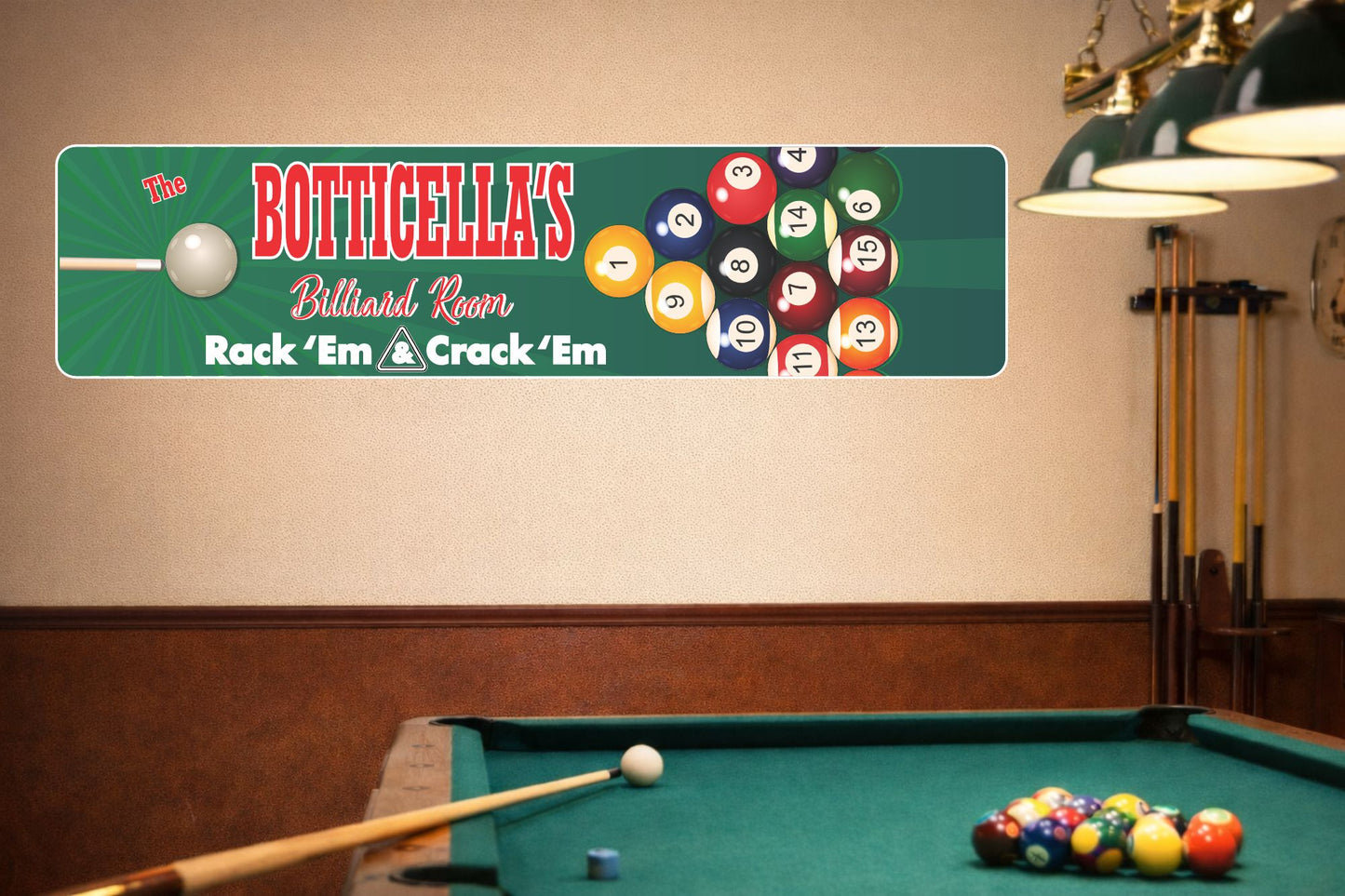 Indoor billiard room with a pool table, cue sticks, and hanging green lights against a beige wall, staged as a background for displaying a personalized game room sign.