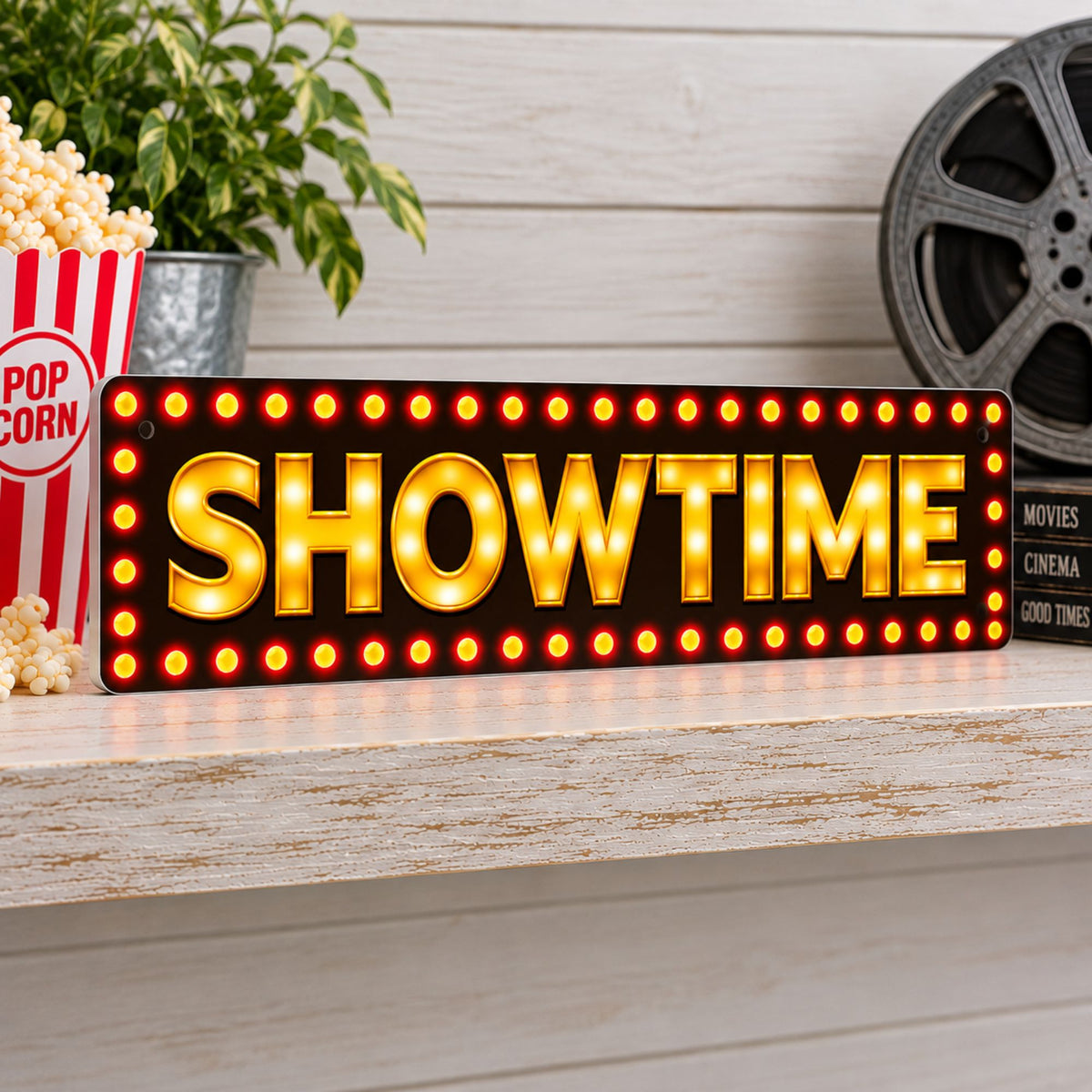 SHOWTIME aluminum movie theater sign displayed on a whitewashed shelf with popcorn and vintage cinema decor.
