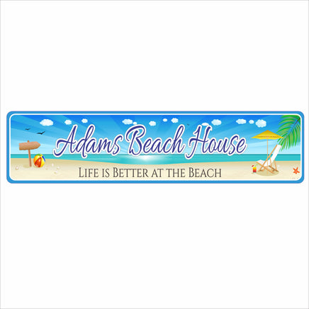 Personalized aluminum beach sign featuring an illustration of a beach with an ocean backdrop, beach chair and umbrella, sea shells, and a beach ball