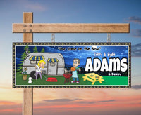 Image of a personalized RV camper sign featuring a cartoon couple, moon, stars, and custom name.