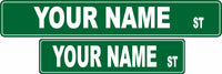 Custom street sign with green background and white lettering, personalized with your name.