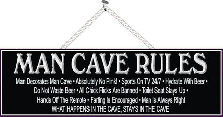 Black and White Man Cave Rules Sign with Border and Aged Font