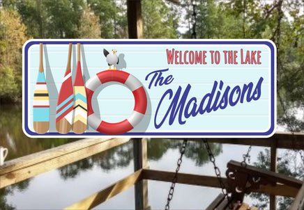 Personalized sign with welcome to the lake quote, oars, life preserver, and seagull design