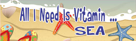 All I Need is Vitamin Sea Beach Sign with Floral Flip Flops, Seashell, Starfish and Overhead View of Surf