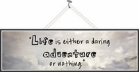 "Life is a Daring Adventure" Inspirational Quote Sign with White Cloud Background
